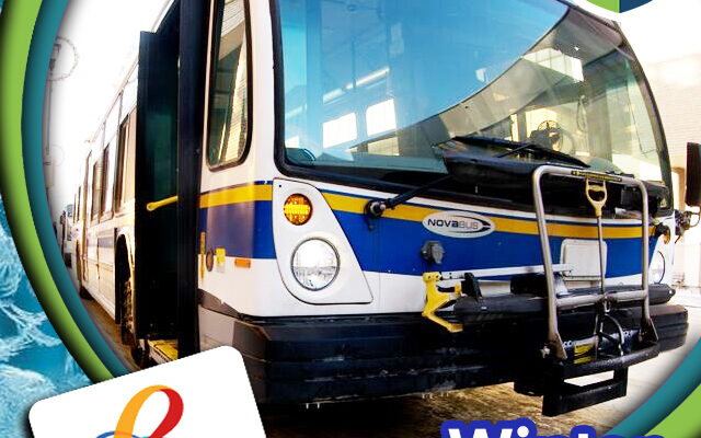 IMAGE DESCRIPTION: The front of a white, yellow, and blue City of Regina Transit bus with a bike rack visible. The text Winter 2021 is visible in the bottom right corner, the URSU logo is in the right top corner, and the City of Regina “R” logo is in the left bottom corner. 